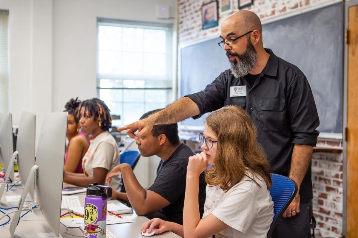 high school students learning graphic design